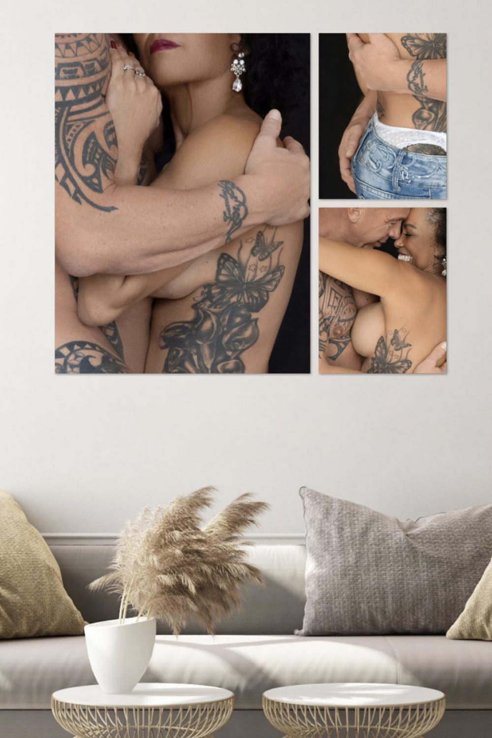 Three-panel wall art above a sofa showing a tattooed couple embracing; the central panel features the woman’s side with a large butterfly tattoo, the top right panel shows the man's hand on her hip with visible tattoos, and the bottom right panel captures their smiling faces close together in an intimate moment.