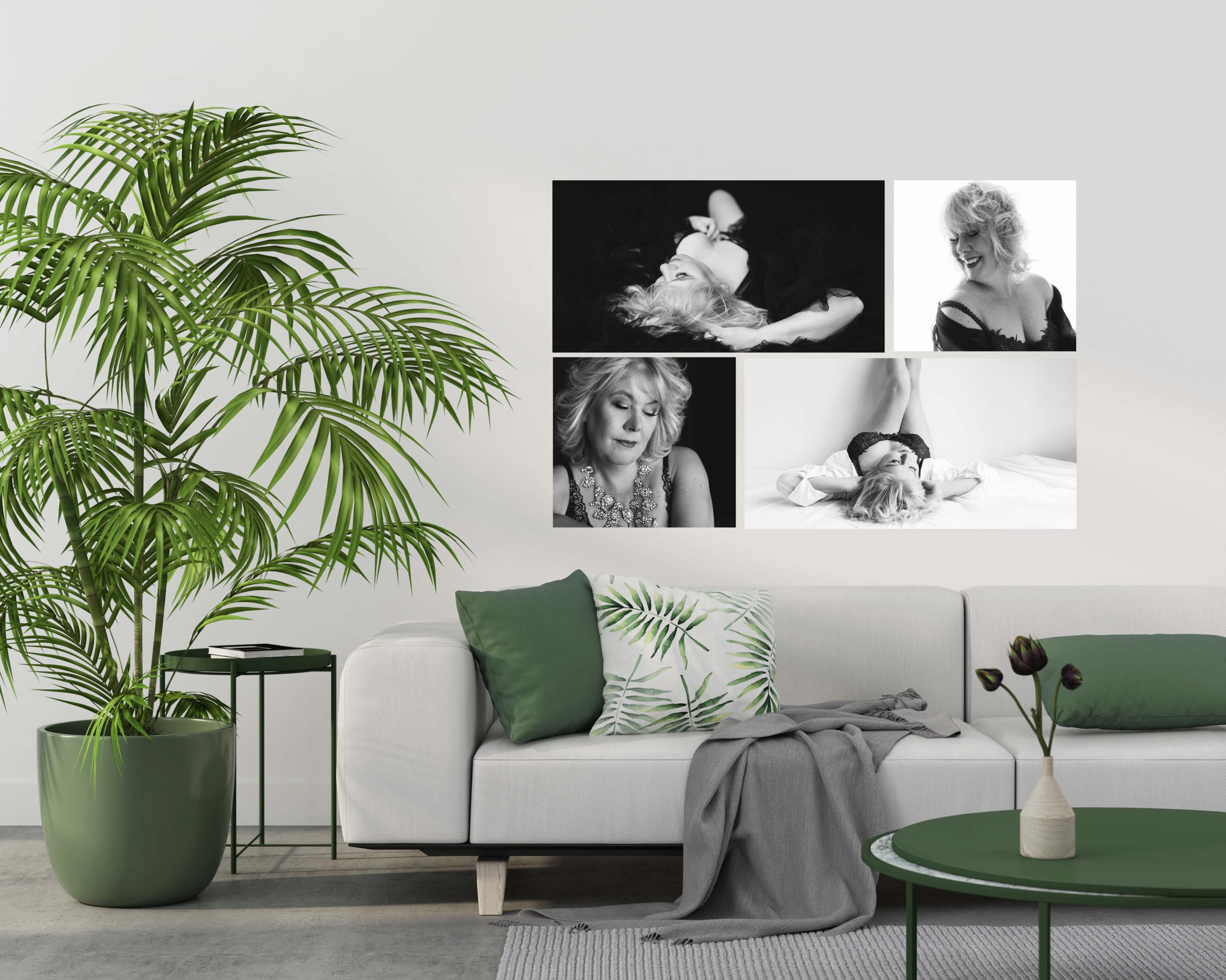 Modern living room with a large green potted plant, white sofa with green and leaf-patterned cushions, gray throw, green side table, green round coffee table with vase holding dark flowers, and a wall collage of four black-and-white photos of a blonde woman posing in various styles and outfits.